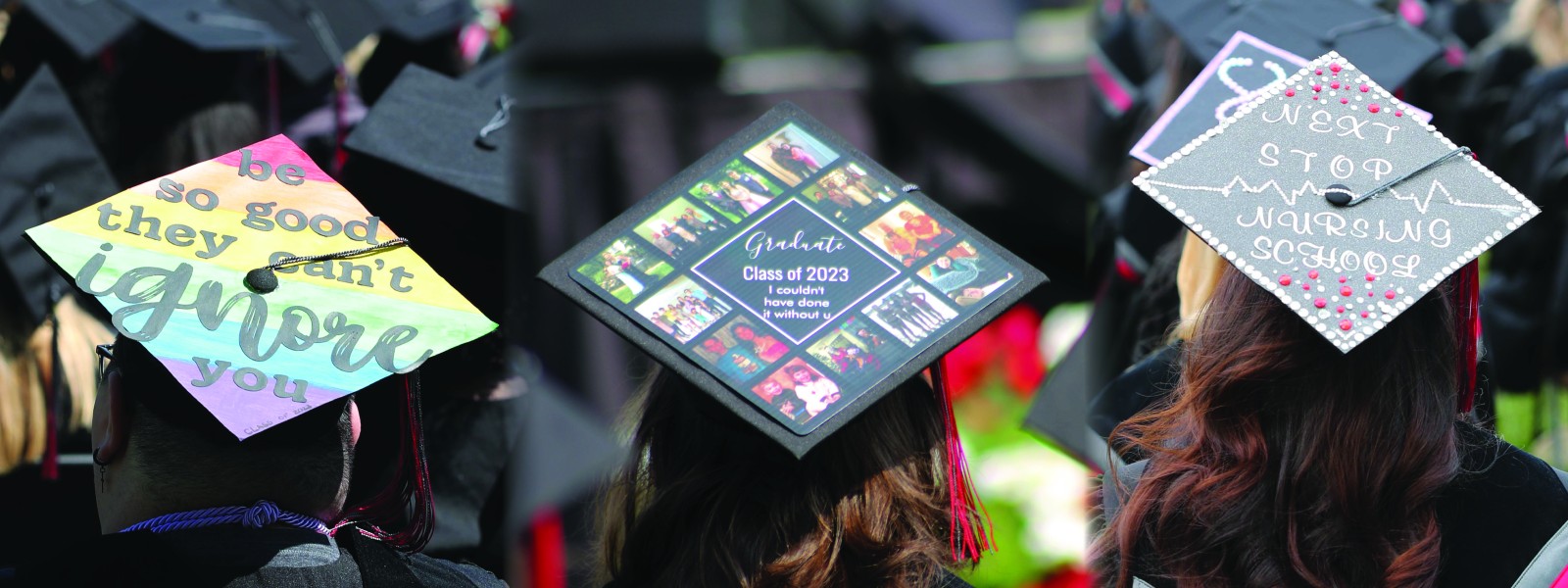 RCBC graduation caps on three students collage