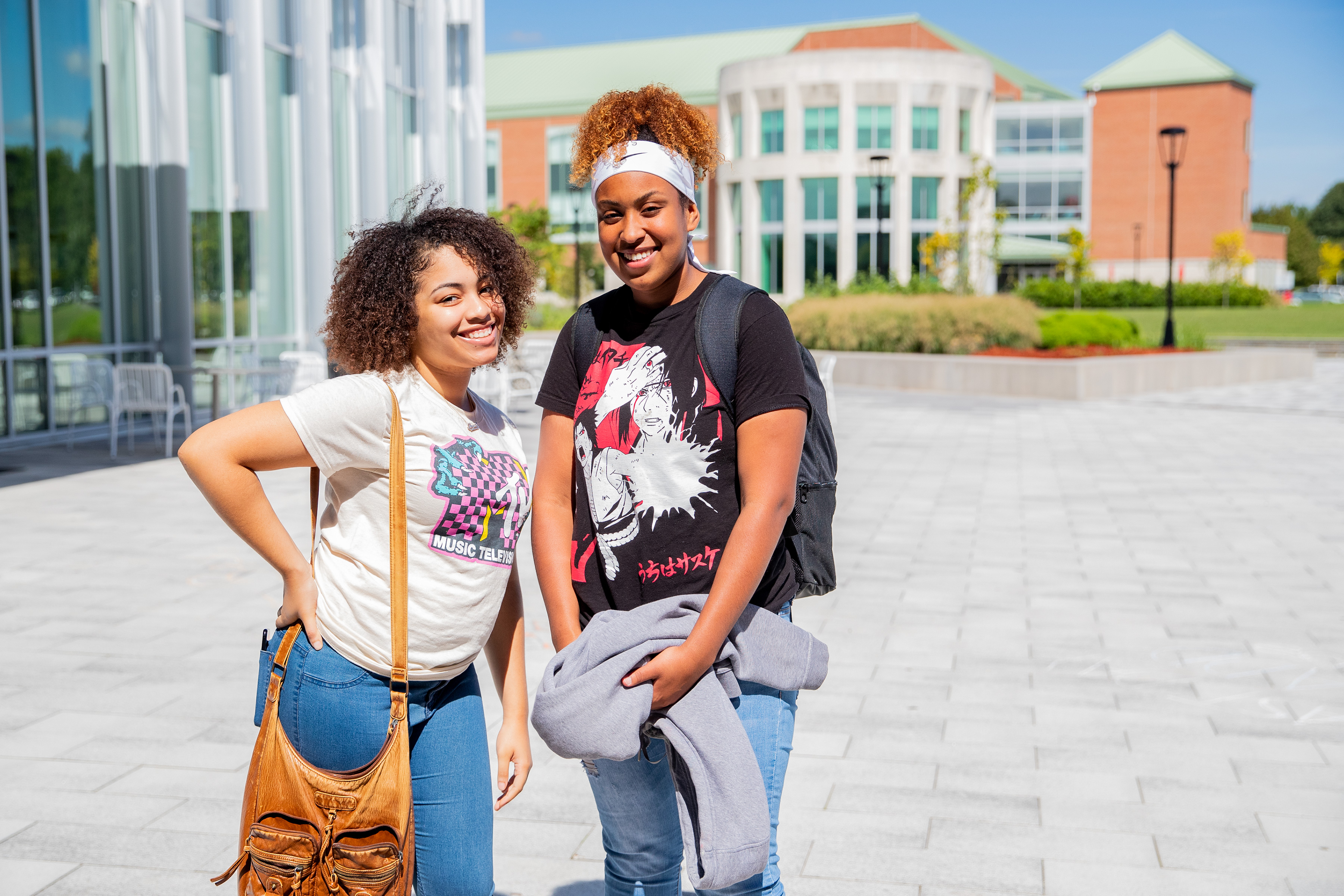 two female students standing in front of Student Success Center
