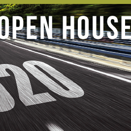 Open House text overlaying empty road 