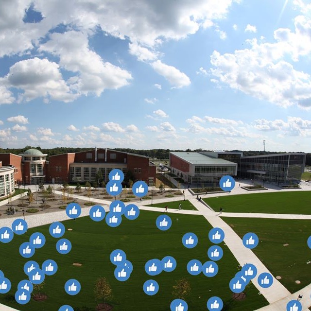 campus photo with thumbs up icons