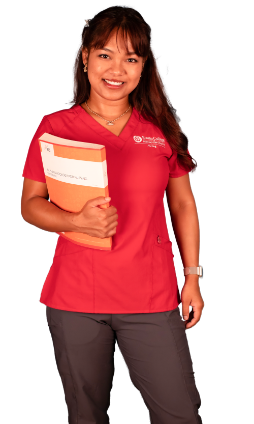 RCBC nursing student holding medical book and smiling