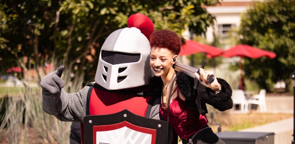 Barry the mascot and an RCBC student taking a selfie