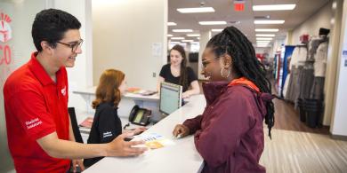 RCBC student helping another student at the student help desk