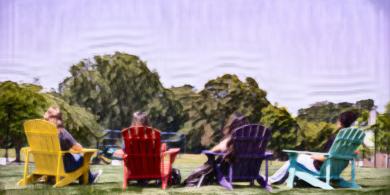 Four RCBC students sitting in colorful Adirondack chairs (photo has crayon filter applied)