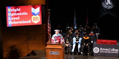 President Cioce at podium during graduation
