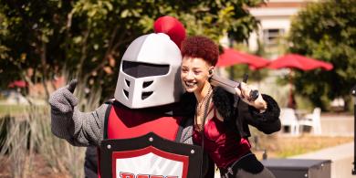 Barry the mascot and an RCBC student taking a selfie