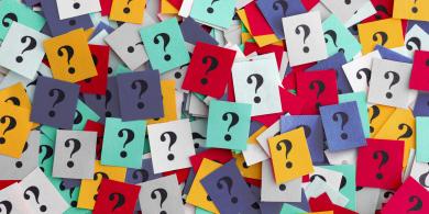 Multiple question marks on sticky notes