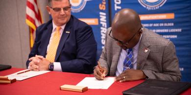 RCBC STEM Dean Dr. Edem Tetteh and LIUNA VP and Eastern Regional Manager Michael Hellstrom sign the agreement.