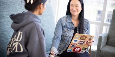 Student counselor helping a student in need of mental health support
