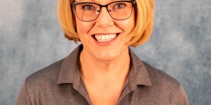 Michele Moyer poses for a headshot.