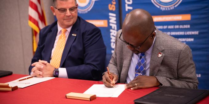 RCBC STEM Dean Dr. Edem Tetteh and LIUNA VP and Eastern Regional Manager Michael Hellstrom sign the agreement.