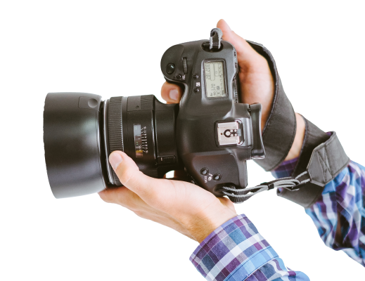 set of hands holding a camera