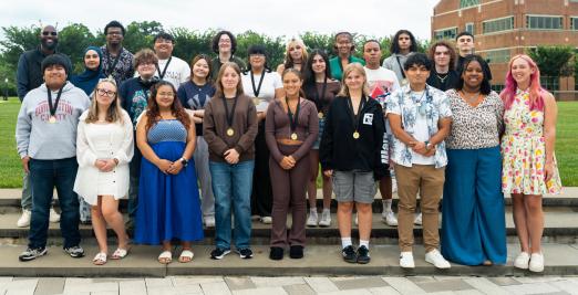 Group photo of EOF staff and students outside on the Student Success Center quad