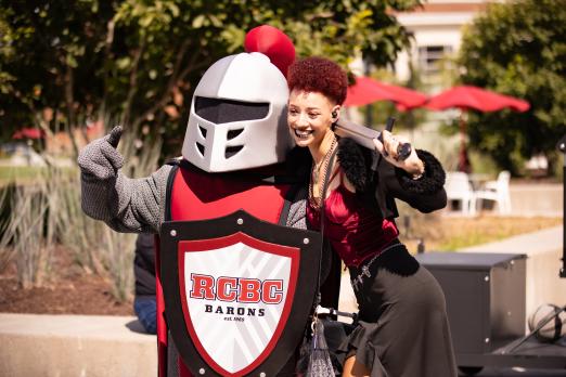 Barry the mascot and an RCBC student taking a selfie