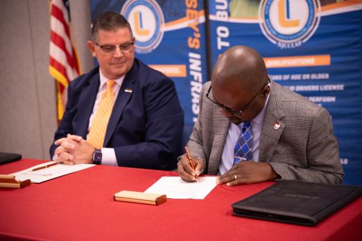 RCBC STEM Dean Dr. Edem Tetteh and LIUNA VP and Eastern Regional Manager Michael Hellstrom sign the agreement.