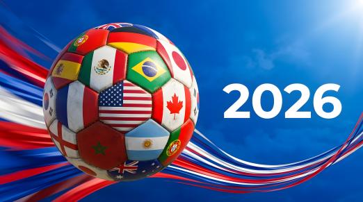 Soccer ball covered with International flags and the year 2026 next to it.