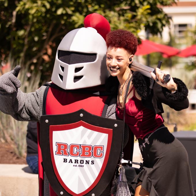 Barry the mascot and an RCBC student taking a selfie